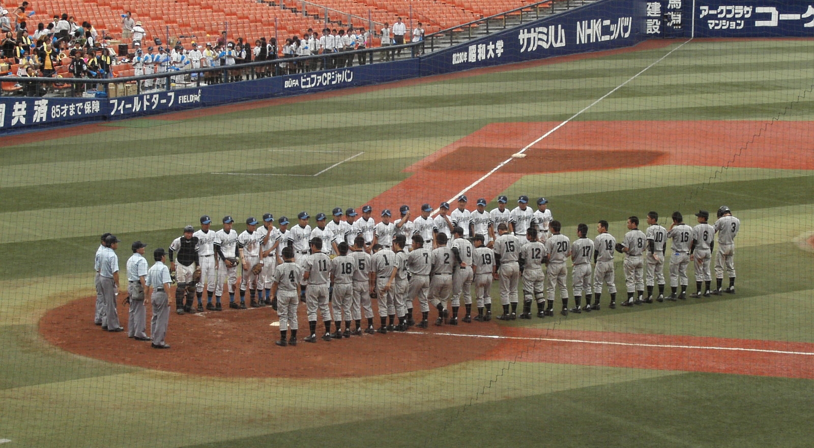 Baseball players in Yokohama Stadium.